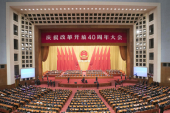 習近平総書記「中国人民の手中では